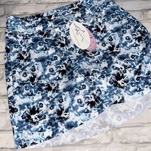 Greg Norman  blue white floral skort layered front 3 pockets golf